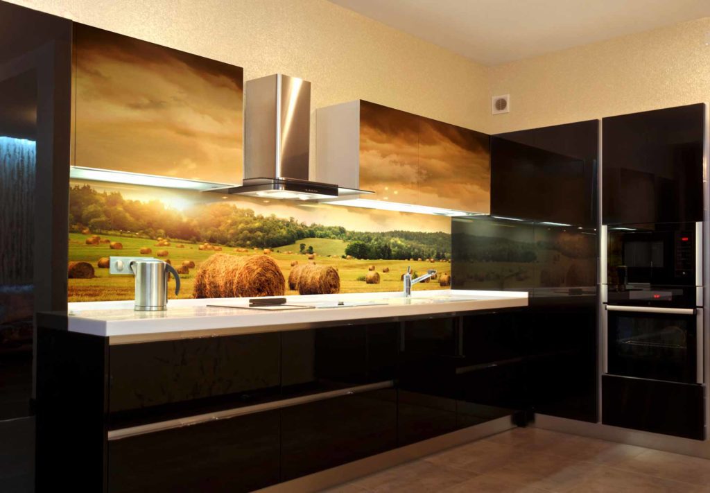 Modern printed glass splashback in a designer kitchen